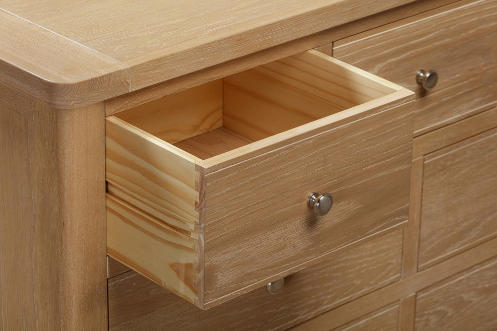 Papaya Foxington 7 Drawer Chest crafted in solid Natural Oak with silver hardware