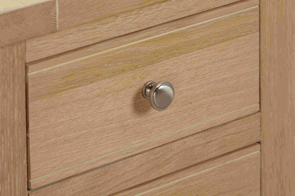 Papaya Foxington Bedside Table in Natural Oak features 3 drawers with stylish metal drawer knobs