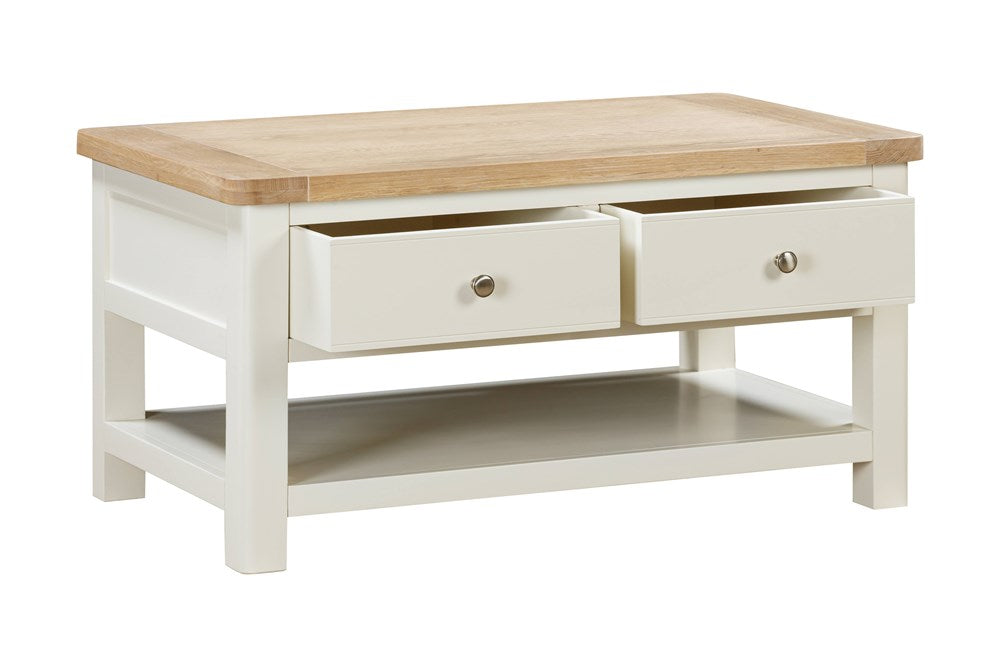 Papaya Foxington Coffee Table with 2 Drawers in an off white painted wood with a solid oak natural table top, silver drawer knobs and a lower shelf for storage