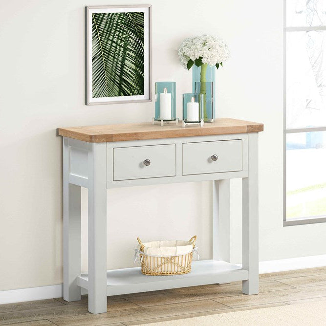 Papaya Foxington Console Table with 2 Drawers and a lower shelf in an off white painted wood with a natural oak table top, and silver metal drawer knobs