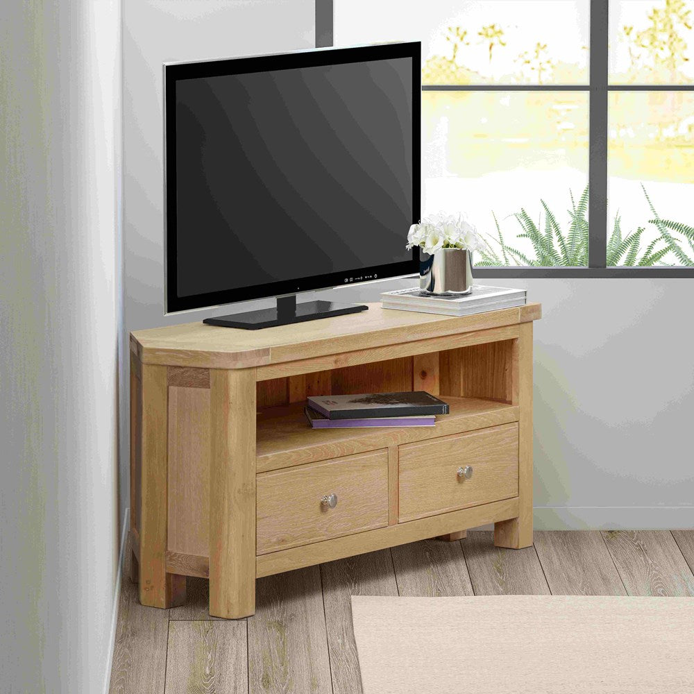 Papaya Foxington Natural Oak Corner TV cabinet includes 2 storage drawers with silver handles and shelf with cable access at the rear