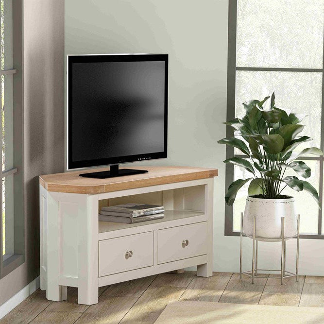 Papaya Foxington Corner TV cabinet features a natural wood top, 2 drawers and an open shelf with cable access in an off white painted wood finish