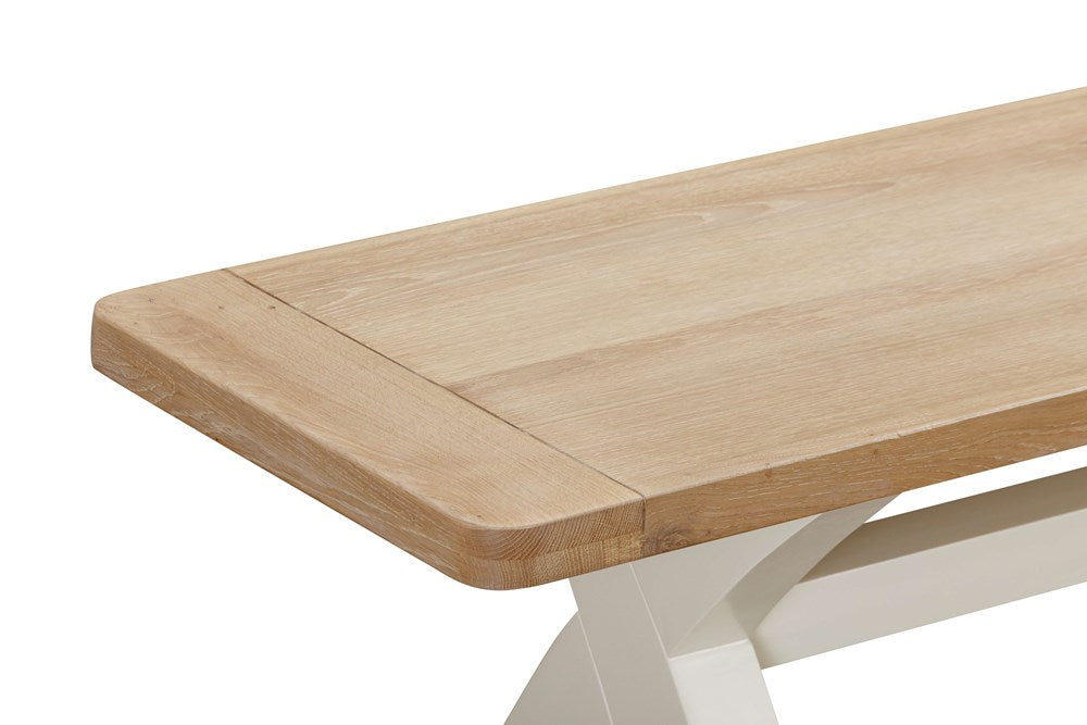Papaya Foxington Cross Leg Dining Bench in an off white painted wood finish with a natural oak solid wood seat, for up to 3 people