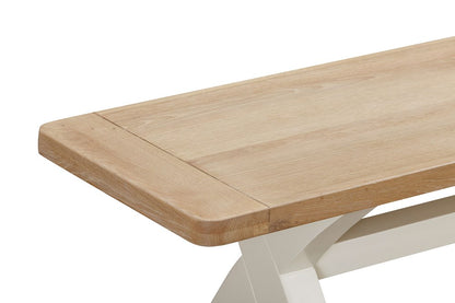 Papaya Foxington Cross Leg Dining Bench in an off white painted wood finish with a natural oak solid wood seat, for up to 3 people