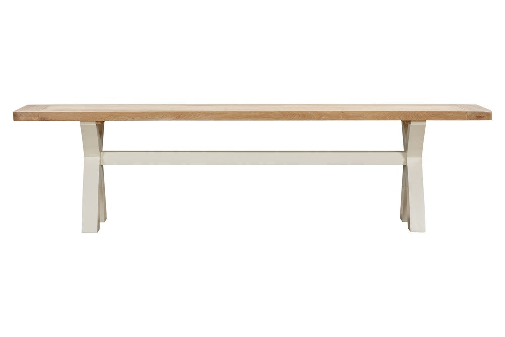 Papaya Foxington Dining Bench can seat up to 3 people and features a natural oak solid wood seat and a cross leg off white painted frame