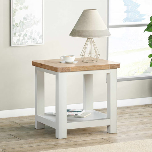 Papaya Foxington Lamp Table features a lower storage shelf, an off white painted base and a natural oak solid wood table top