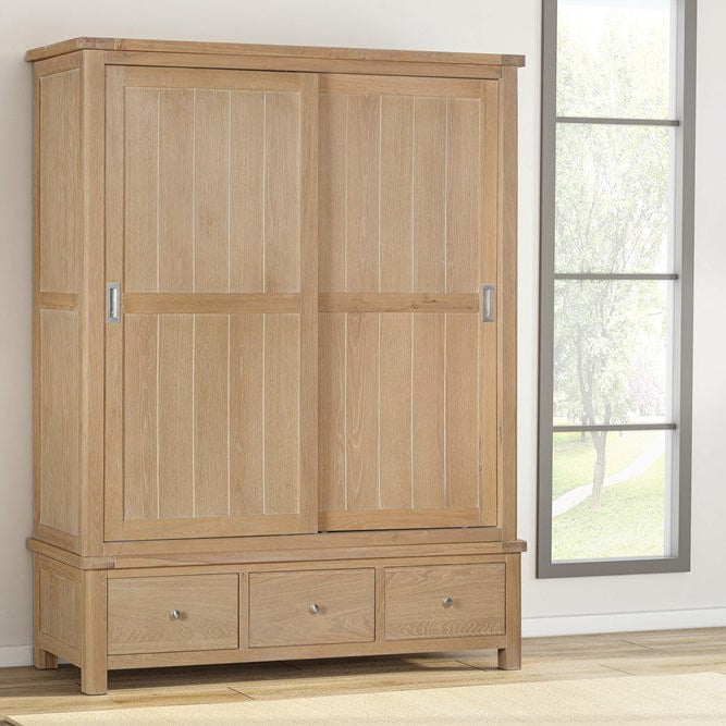 Papaya Foxington Large Wardrobe in solid Natural Oak features two sliding doors and three lower storage drawers 