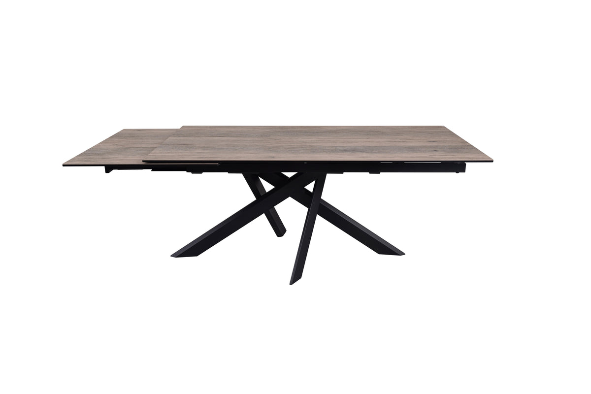 Front studio view of the Ravenna 180cm Dining Table in Ceramic Woodgrain, showing its woodgrain top and black crossed base.