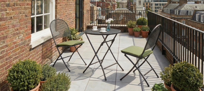 Royal Garden Café Latte Bistro Set is the perfect set for small outdoor spaces, it features a small folding table and 2 folding chairs with green seat cushions