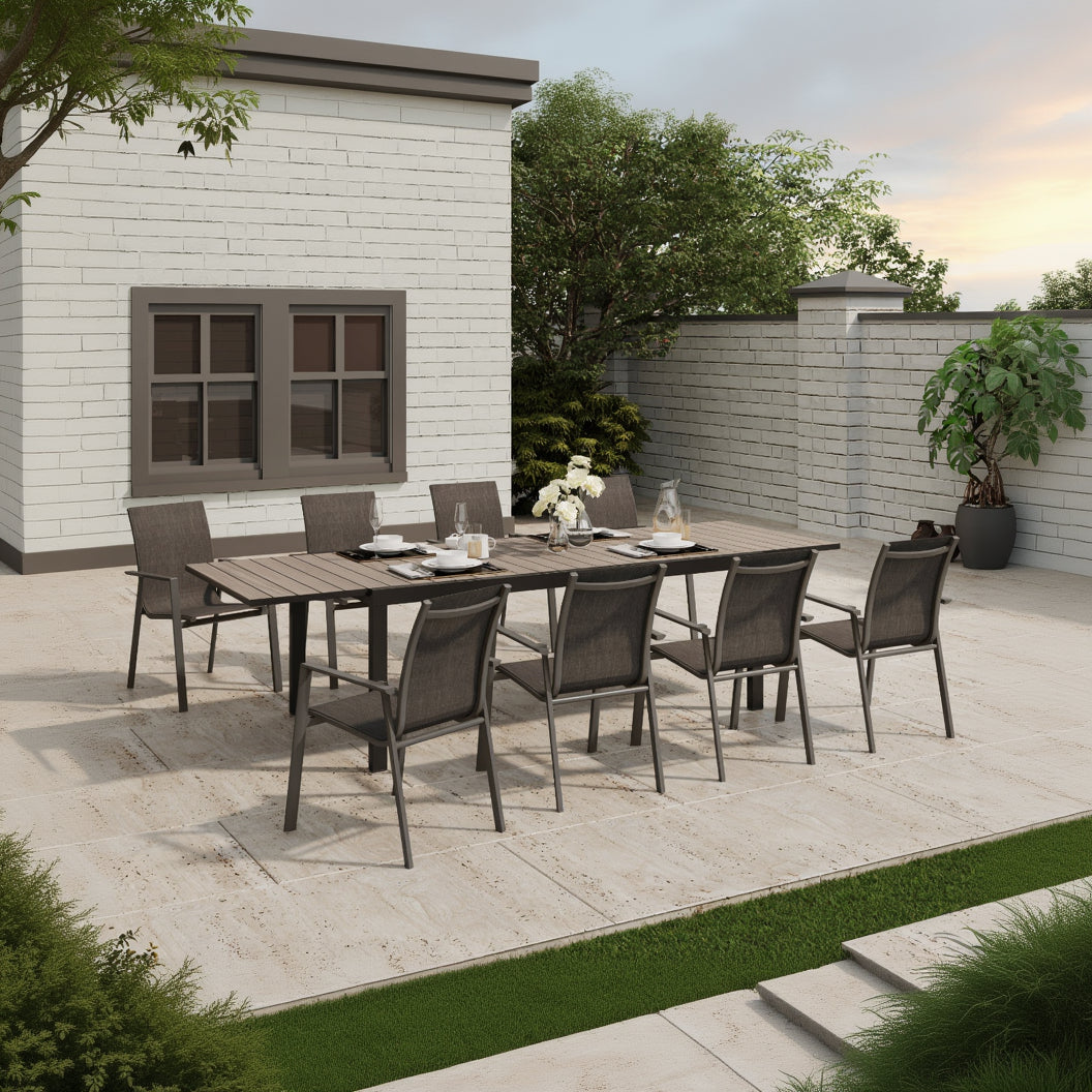 Royal Garden Catala 8 Seat Extending Dining Set includes 8 aluminium stackable chairs with textilene fabric seats, and a large extending table with a wood-effect table top in a charcoal grey finish
