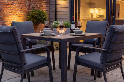 Royal Garden Cordoba 4 Seat Square Dining Set with a durable polywood table top, aluminium frame and 4 luxuriously padded armchairs