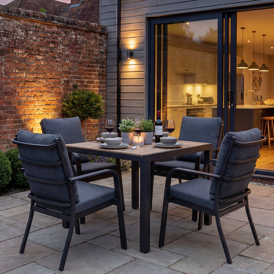 Royal Garden Cordoba 4 Seat Square Dining Set in charcoal grey with aluminium frame and polywood table top, and 4 generously cushioned armchairs