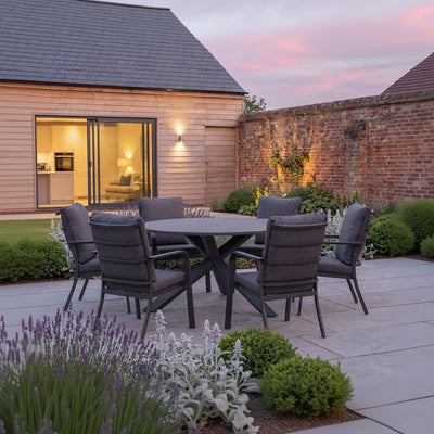 Royal Garden Cordoba Dining Set features a round aluminium table and six generously padded armchairs