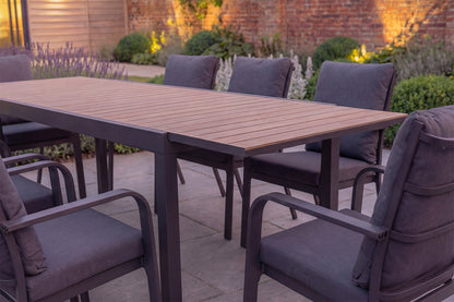 Royal Garden Cordoba 8 Seat Extending Dining Set features 8 cushioned armchairs, and an extendable dining table with aluminium frame and polywood slatted table top