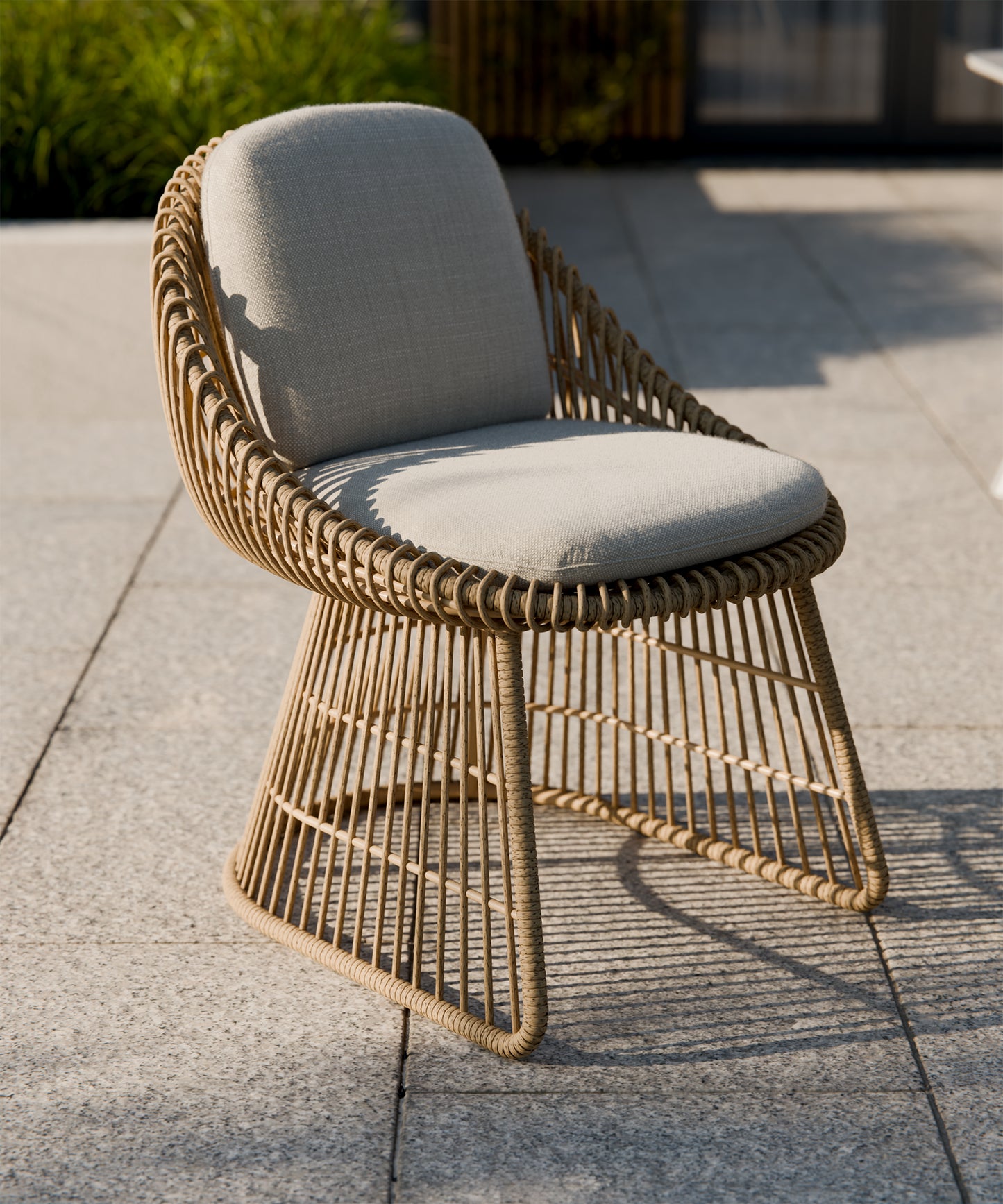 Royal Garden Norden 6 Seater Dining Set features six woven rattan-effect chairs with natural toned padded cushions to complement the sleek white dining table