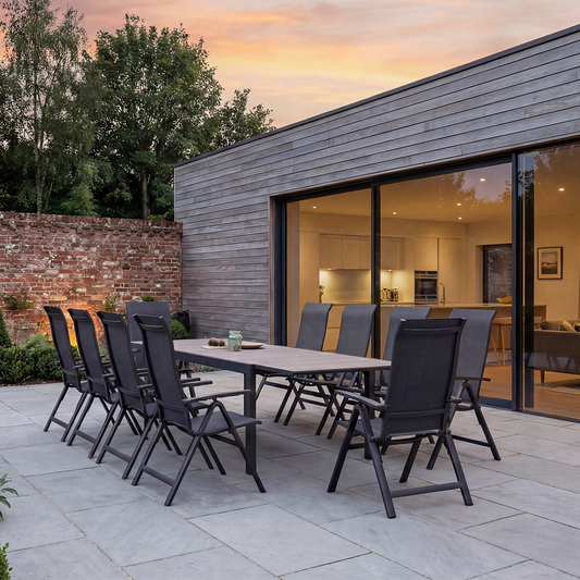 Royal Garden Vidoo 10 Seat Extending Dining Set features an extendable dining table with slatted table top and aluminium frame, with 10 reclining chairs that can be folded for easy storage