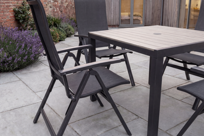 Royal Garden Vidoo 4 Seat Square Dining Set features an aluminium framed dining table with parasol hole, and 4 multi position reclining chairs