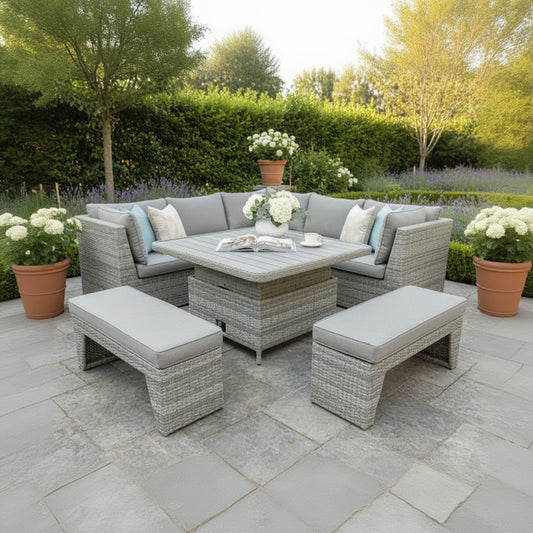 The Supremo Mauritius Grand Square Corner Set in Tabby Grey features an l-shaped corner sofa and 2 benches all with deep plush grey cushions, and a height adjustable dining table, ideal for outdoor living