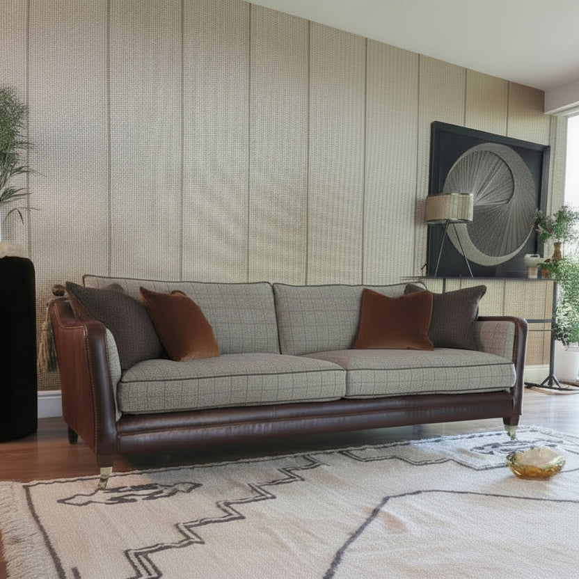 Tetrad Balmoral Petit Sofa in Austin Cumin Seed & Munro Check upholstery with brown leather panels, dark wooden feet and matching scatter cushions