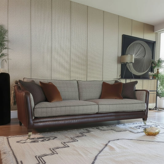 Tetrad Balmoral Petit Sofa in Austin Cumin Seed & Munro Check upholstery with brown leather panels, dark wooden feet and matching scatter cushions