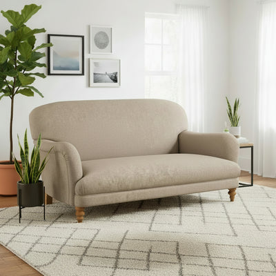 Tetrad Braemar Petit Sofa in a Genuine Heather Harris Tweed fabric with complementary Brompton Tan Leather Piping, in a natural colour palette, with natural wooden legs