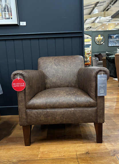Tetrad Camford Chair in Distressed Leather Brown Hide with deep seat cushion, comfortable rounded arms and dark wood legs