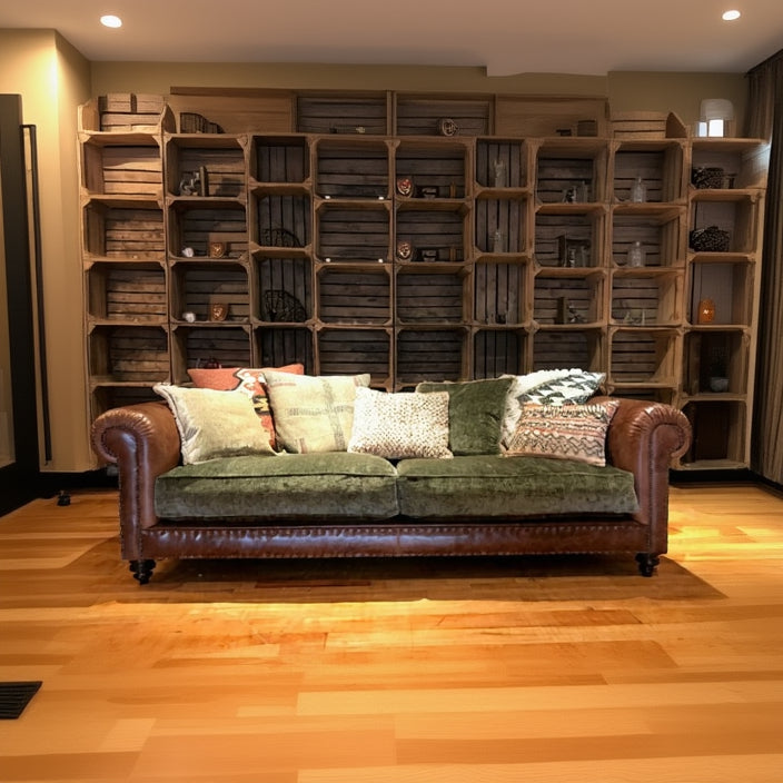 Tetrad Constable Midi Sofa can seat 2-3 people, crafted in Galveston Bark Tan Leather, with sage green velvet seat cushions and a variety of coordinating scatter back cushions