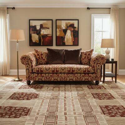 The Tetrad Elgar Midi Sofa is upholstered in the stunning Enigma Claret Damask Fabric, with deep cushioned seating, elegant scrolled arms, dark wooden feet and co-ordinating scatter cushions