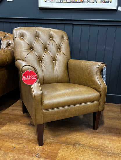 Tetrad Flynn Chair in Dark Brown Hide premium leather with button tufted backrest and dark wood legs 