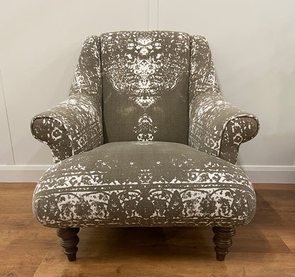 Tetrad Jacaranda Chair in Bagru Khaki and Cream pattern Fabric, with rolled arms and dark wood turned legs