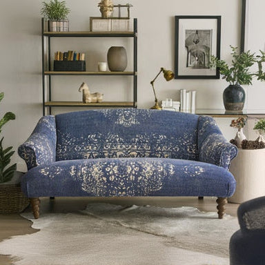 Tetrad Jacaranda Petit Sofa in Bagru Indigo and Cream pattern fabric with turned wooden legs