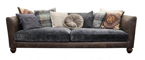 Tetrad Lowry Grand Sofa can seat 3-4 people and is crafted in premium dark brown leather and a crushed velvet upholstery, with a range of coordinating scatter back cushions