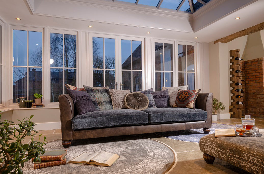 Tetrad Lowry Grand Sofa in a Leather and Velvet combination with a range of complementary scatter back cushions 