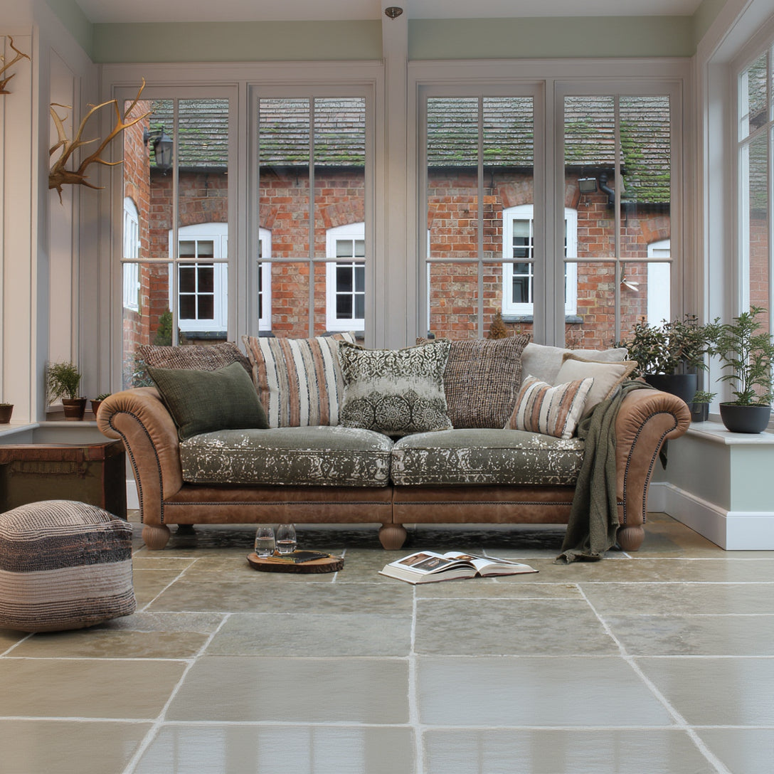 Tetrad Montana Grand Sofa in Atacama Nutmeg Leather can seat 3-4 people, crafted from a premium leather and patterned fabric with matching scatter cushions