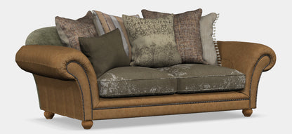 Tetrad Montana Midi Sofa in Atacama Nutmeg Leather, features brass stud detailing, patterned fabric cushions and traditional Bun feet