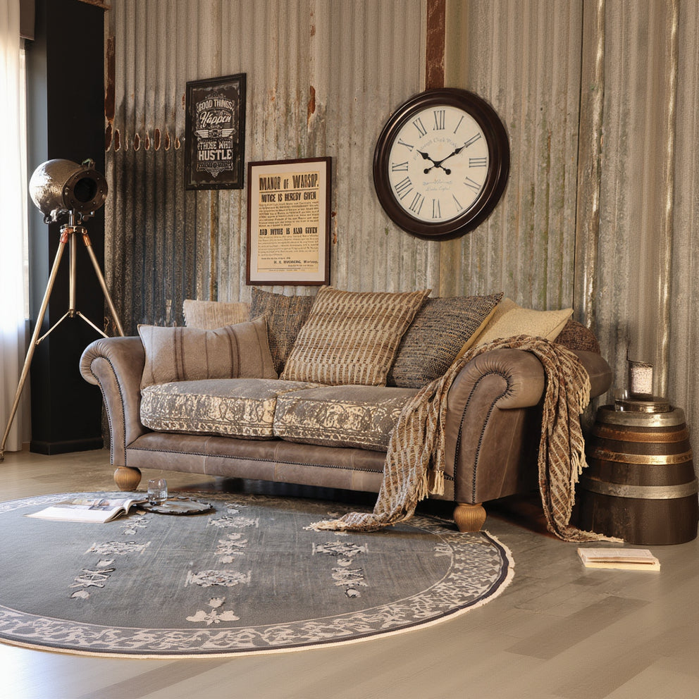 Tetrad Montana Midi Sofa in Atacama Pewter Leather with champagne gold toned crushed velvet seat cushions and coordinating scatter back cushions