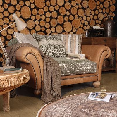 Tetrad Montana Snuggler Sofa for 1-2 people in Atacama Nutmeg Premium Leather with a patterned fabric seat cushion and matching scatter backs.