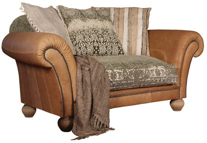 Tetrad Montana Snuggler Sofa in Atacama Nutmeg Leather with scrolled arms and brass stud detailing, traditional Bun feet, and khaki pattern seat cushions