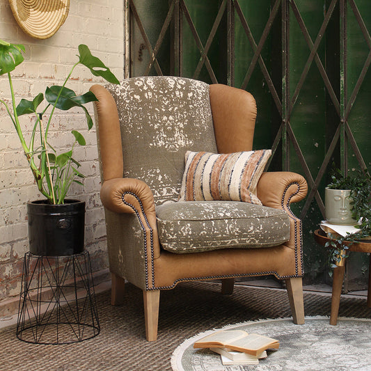 Tetrad Montana Wing Armchair in Atacama Nutmeg Premium Leather and patterned fabric upholstery with natural wood legs