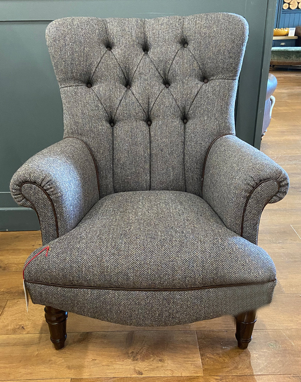 Tetrad Regent Chair in Basalt Herringbone elegant charcoal grey tone with contrasting Old Bard Piping and button tufted detailing on the back