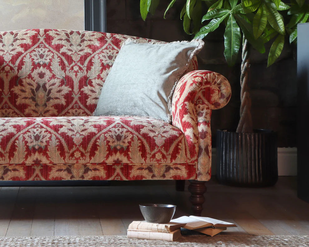 Tetrad Tallis Grand Sofa in Enigma Claret luxurious damask upholstery in deep claret ed with cream scatter cushions, elegant scrolled arms and dark wood legs