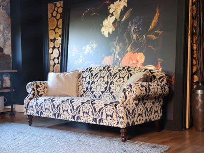 Tetrad Tallis Midi Sofa in Enigma Indigo fabric with a damask pattern in blue and cream with traditional features and complementary cream scatter cushions