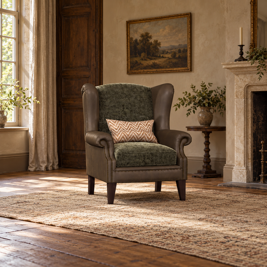 Tetrad Warwick Wing Chair in Coco Velvet Olive Fabric and Comanche Timber Leather — lifestyle visualisation generated from the product cutout.