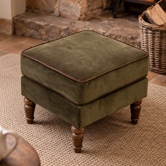 Vintage Sofa Company Alba Footstool in Verona Seaweed with Piping shown complete in a square lifestyle room photograph