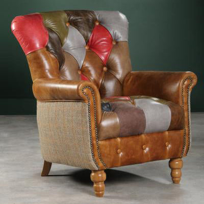 Vintage Sofa Company Alderley Patchwork Armchair Upholstered in a eclectic Patchwork Leather, with button tufting, brass stud detailing and Harris tweed panelled sides