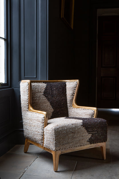 Vintage Sofa Company Ballari Accent Chair with boucle style fabric in cream and charcoal colours with an exposed wooden frame