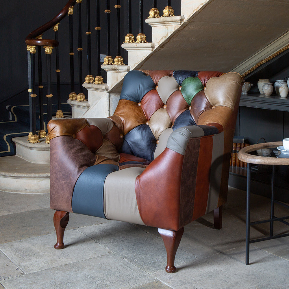 Vintage Sofa Company Bamford Leather Patchwork Armchair is a bold take on the classic Chesterfield armchair, this leather patchwork design brings rich colour, deep buttoning and traditional detailing with a mix of leather tones.