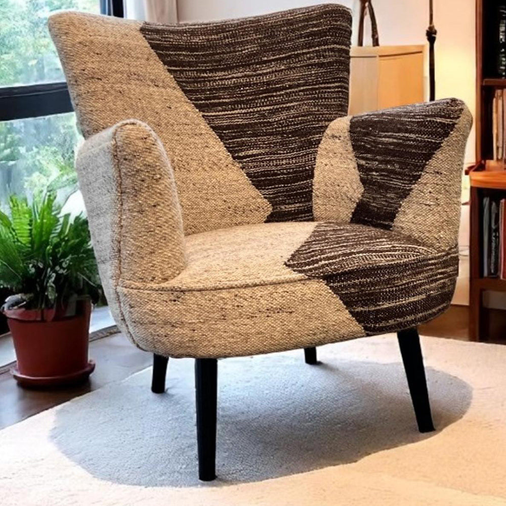 Vintage Sofa Company Barak Accent Chair features exaggerated winged arms, a curved seat, black legs and is upholstered in a boucle style fabric