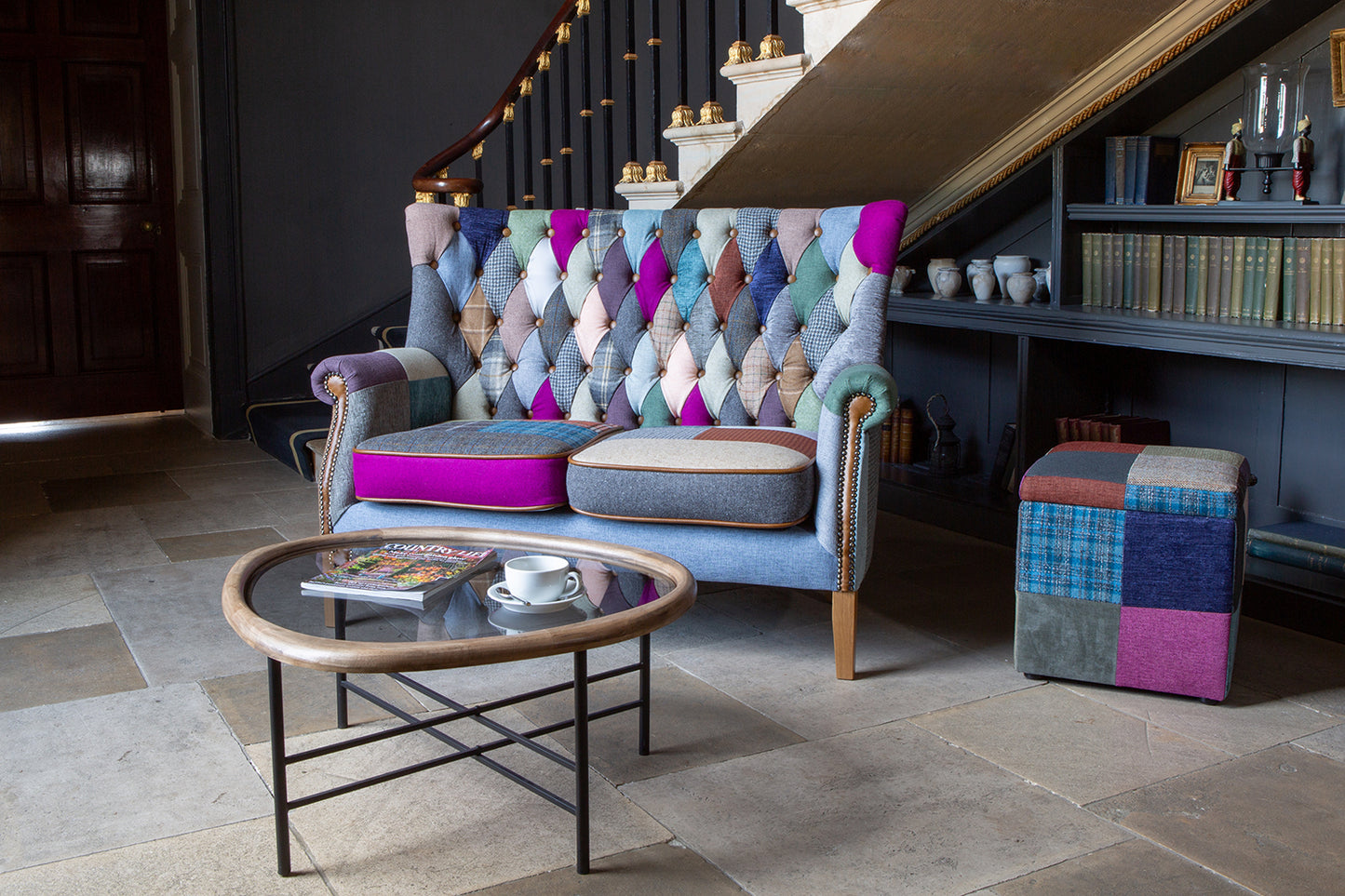 Vintage Sofa Company Barnard Patchwork 2 Seater Sofa with a classic wingback shape, the Barnard brings colour, texture and comfort into one distinctive design, with deep buttoning and wooden legs