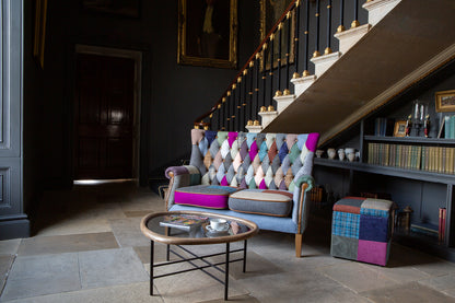 Vintage Sofa Company Barnard Patchwork 2 Seater Sofa features a high wingback, diamond button tufting, generously padded seat cushions, scrolled arms and brass stud detailing